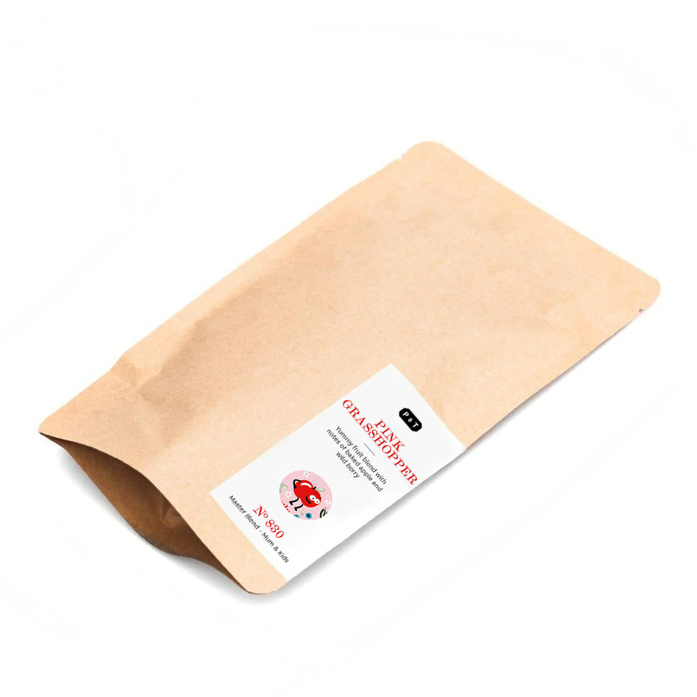 Braune Kraftpapierverpackung mit Etikett, enthaltend Pink Grasshopper Tee für Mum & Kids von P & T.