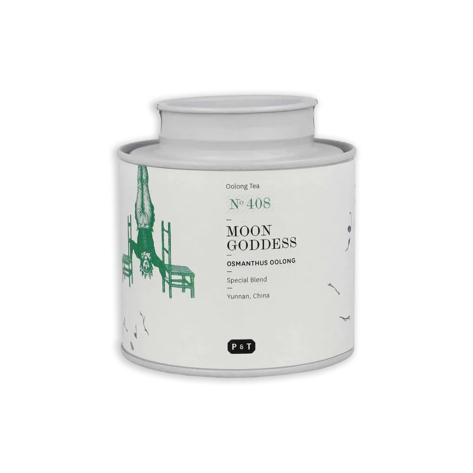 Weiße zylindrische Teedose mit grüner Handstand-Illustration; MOON GODDESS Osmanthus Oolong Tee aus Yunnan.